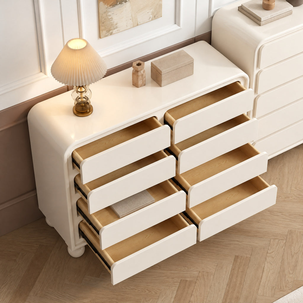 Commode crème pieds boule, tiroirs ouverts