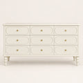 Grande commode crème 9 tiroirs, pieds tournés, vue de face