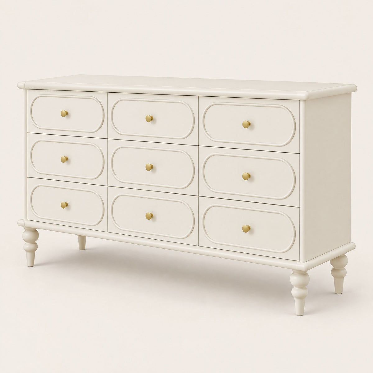 Grande commode crème 9 tiroirs, pieds tournés, vue de trois quarts