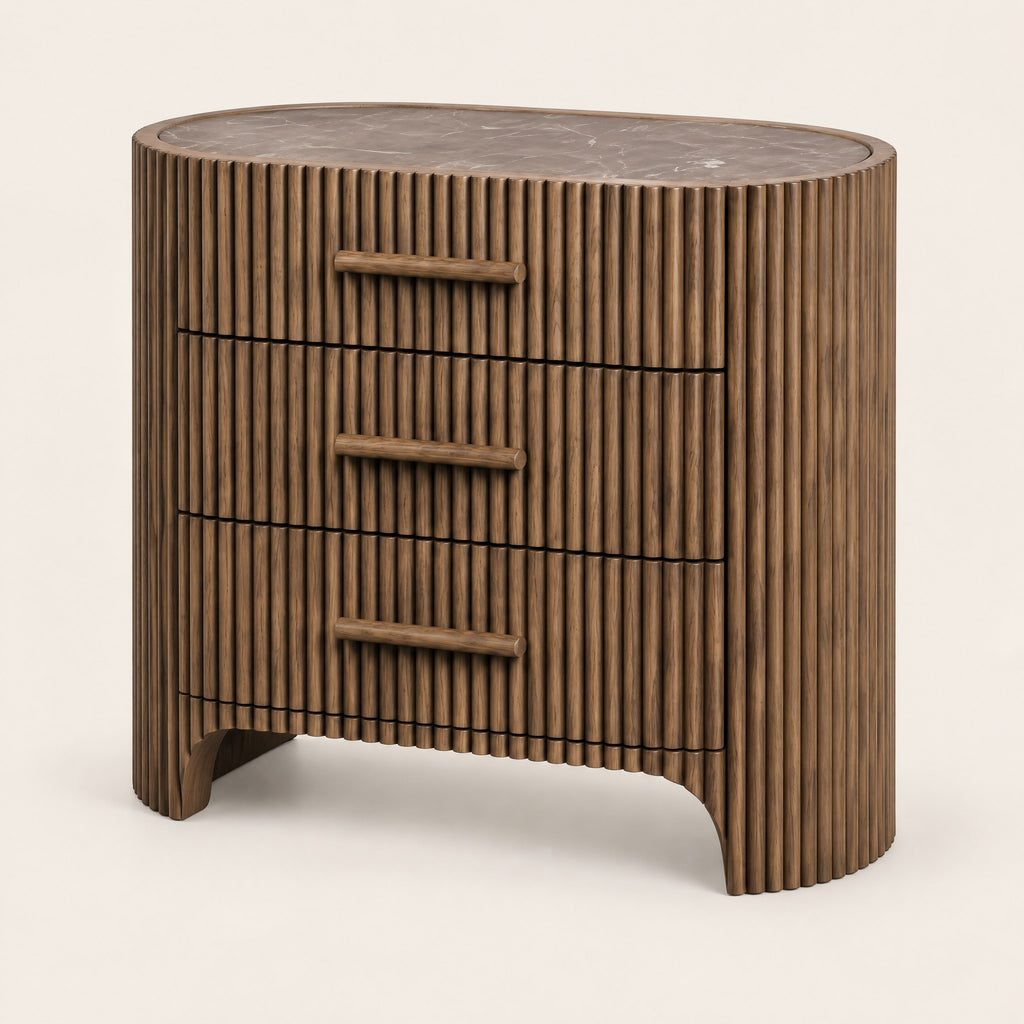 Petite commode ovale cannelée, plateau en marbre, vue de trois quarts